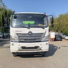 全新12立方福田柴油环卫垃圾车，手动变速箱，4×2驱动，国四排放标准，用于垃圾转运与运输。