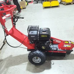 Professional stump crusher, hand-pushed gasoline-powered with 15 horsepower. Stump grinding and crushing machine, direct from manufacturer.