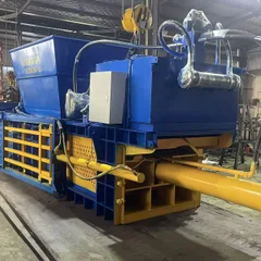 80T-200T horizontal operation. Waste paper box, beverage bottle, and other waste material bundling machine.