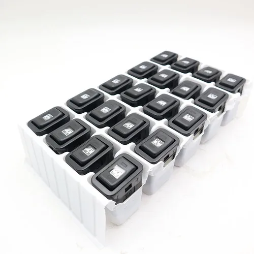 The original switch part numbers for the Komatsu dump truck's power windows are 426-56-21490 and 4265621490.