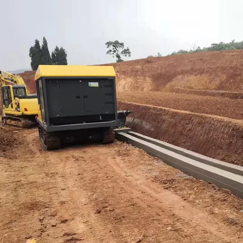 Steel tracked curbstone forming machine