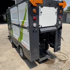 Compact Ride-On Electric Floor Sweeper with Enclosed Cab, Industrial Road Sweeper