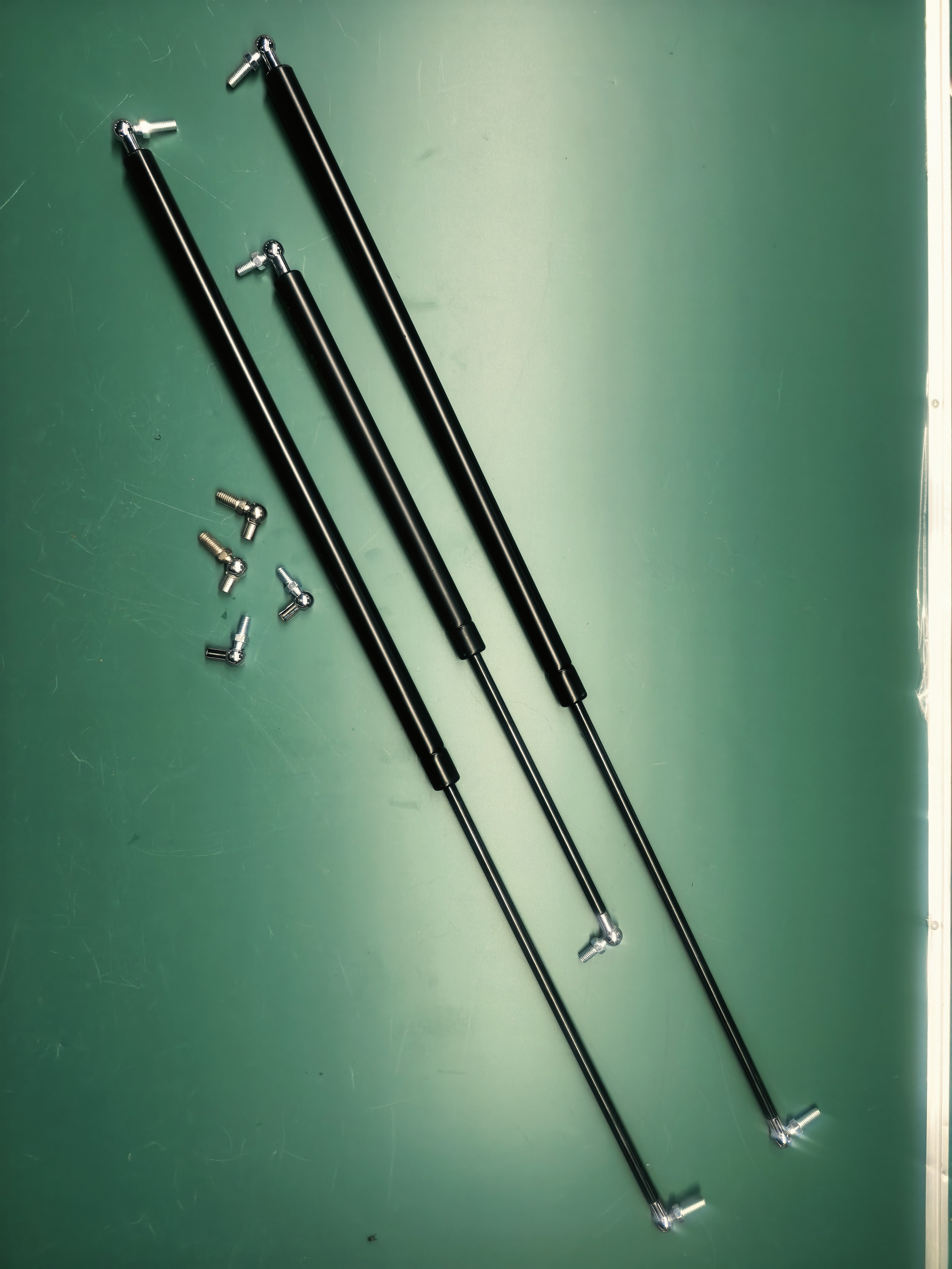 Gas spring for agricultural equipment