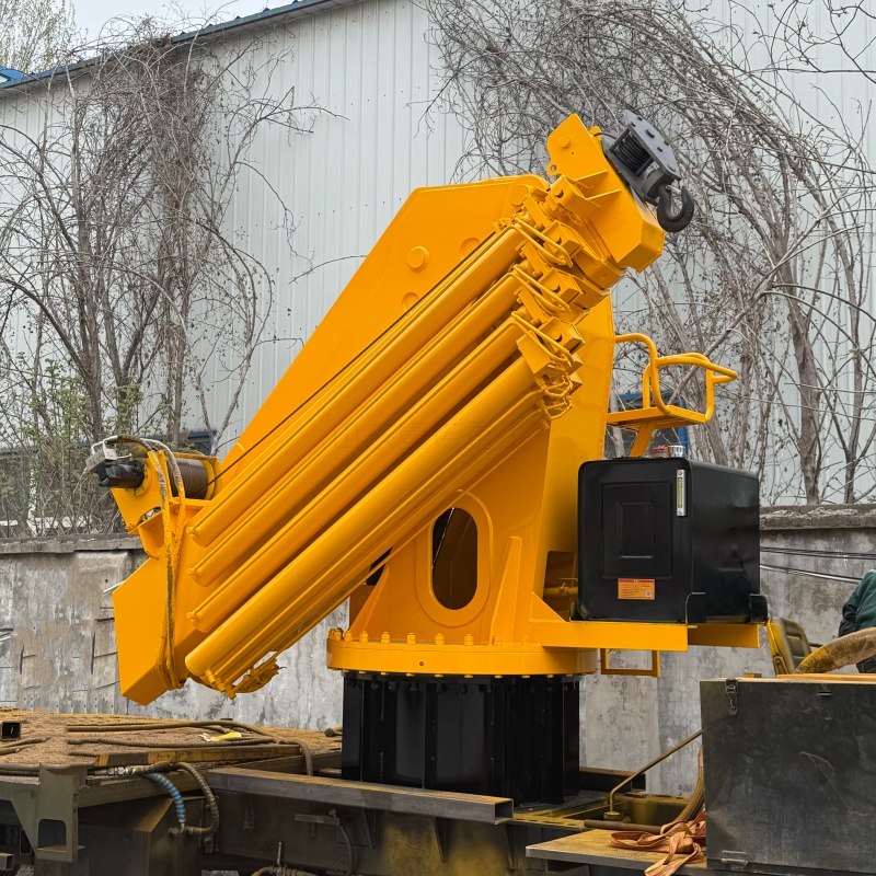 Vehicle mounted folding arm crane