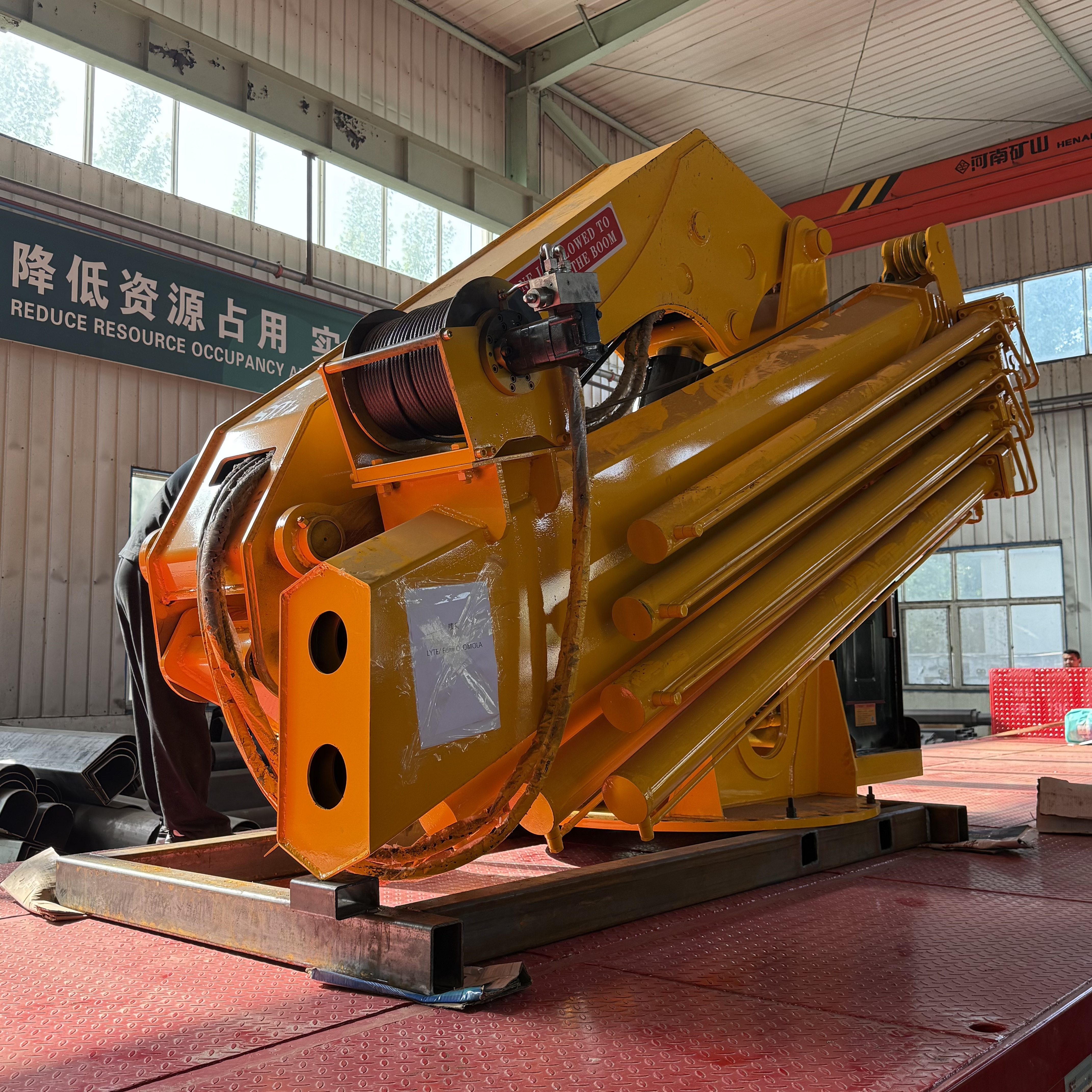 Vehicle mounted folding arm crane