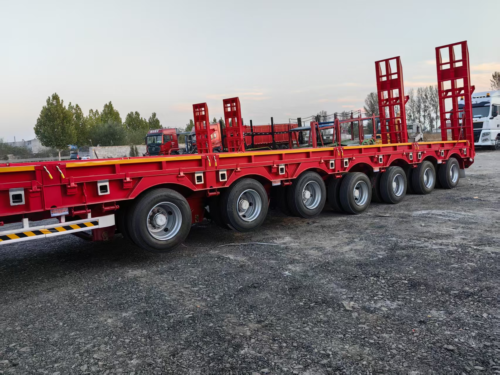 7 Axles 17m Lowbed Semi Trailer for Uzbekistan Export Extendable to 22m Hydraulic Ladder 6 Axles 16.5m Lifting Axle Heavy Transport Trailer
