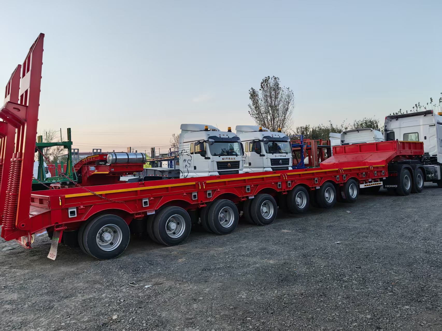 7 Axles 17m Lowbed Semi Trailer for Uzbekistan Export Extendable to 22m Hydraulic Ladder 6 Axles 16.5m Lifting Axle Heavy Transport Trailer