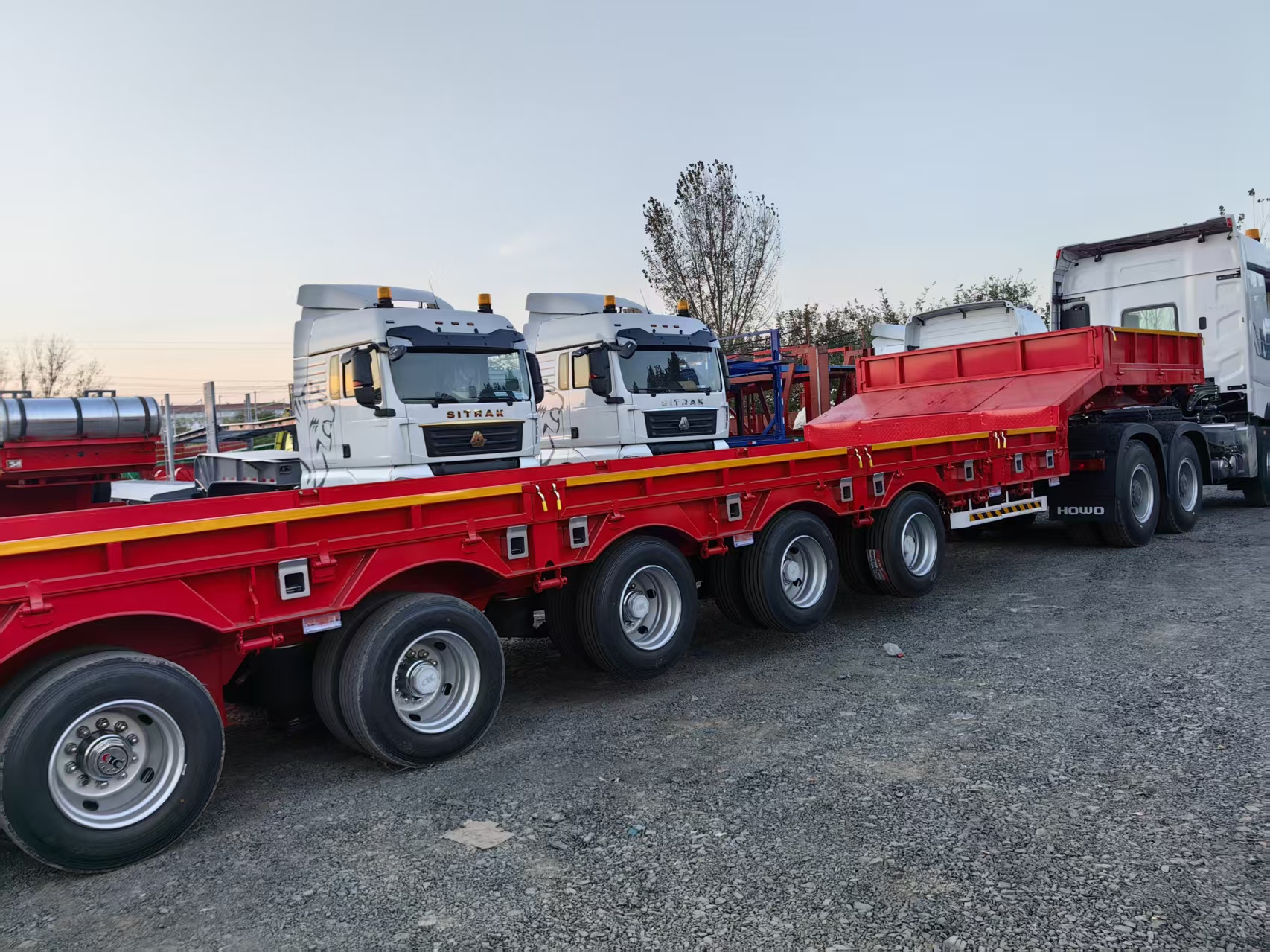 7 Axles 17m Lowbed Semi Trailer for Uzbekistan Export Extendable to 22m Hydraulic Ladder 6 Axles 16.5m Lifting Axle Heavy Transport Trailer
