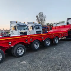 7 Axles 17m Lowbed Semi Trailer for Uzbekistan Export Extendable to 22m Hydraulic Ladder 6 Axles 16.5m Lifting Axle Heavy Transport Trailer