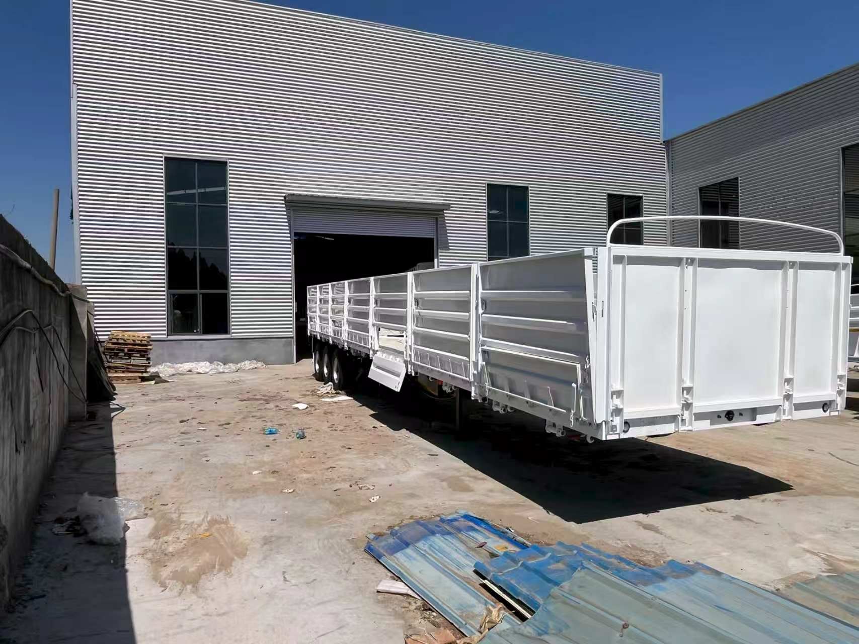 3 Axle Dropside Side Wall Semi Trailer 40-60Ton for Africa Middle East Bulk & Construction Cargo Transport