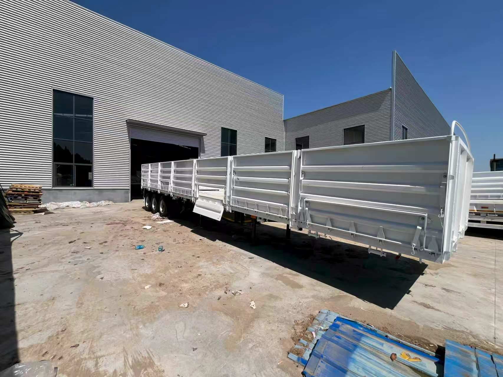 3 Axle Dropside Side Wall Semi Trailer 40-60Ton for Africa Middle East Bulk & Construction Cargo Transport