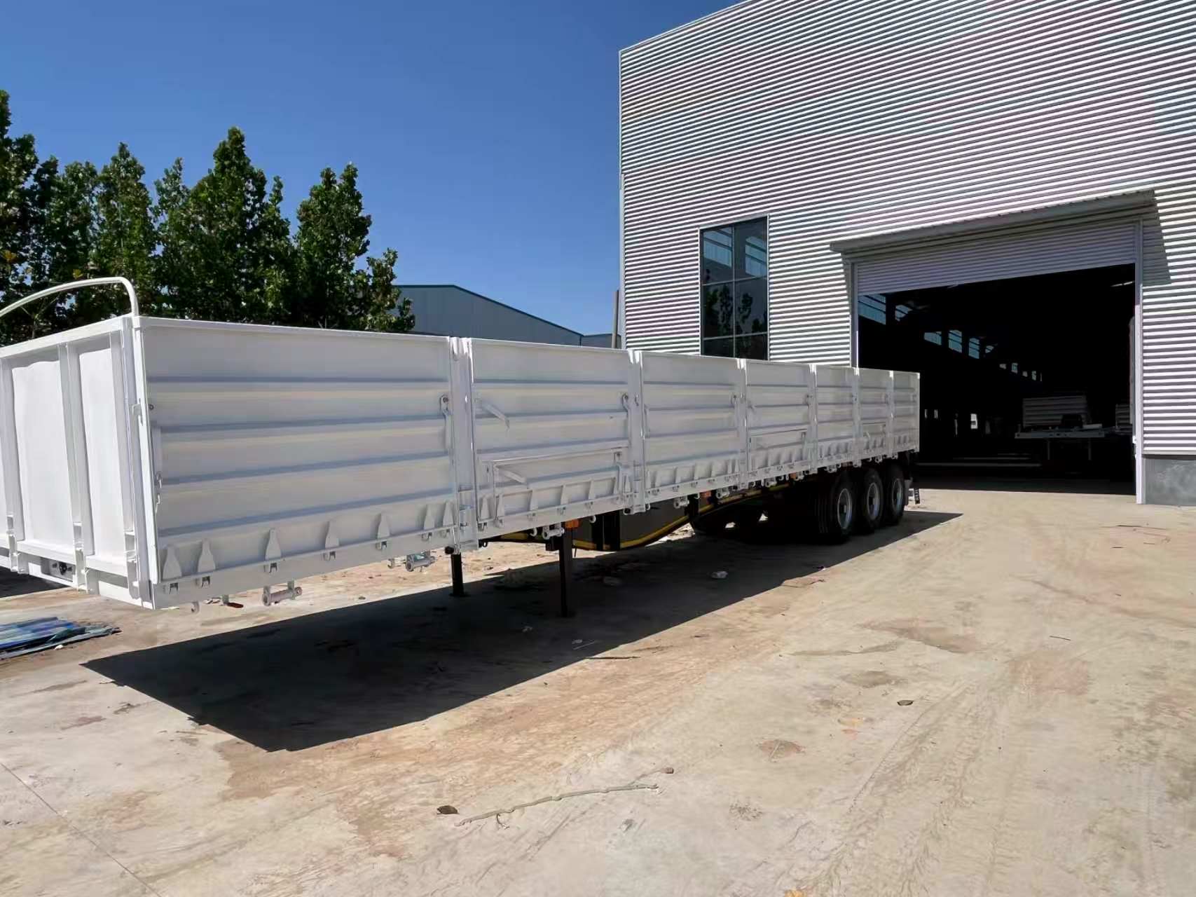 3 Axle Dropside Side Wall Semi Trailer 40-60Ton for Africa Middle East Bulk & Construction Cargo Transport