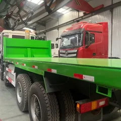 中国重汽出口8×4电池驱动自卸车，支持快速充电和电池更换