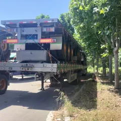 Semirremolque de plataforma plana de tres ejes de 13 m, semirremolque de transporte de contenedores y carga de acero.
