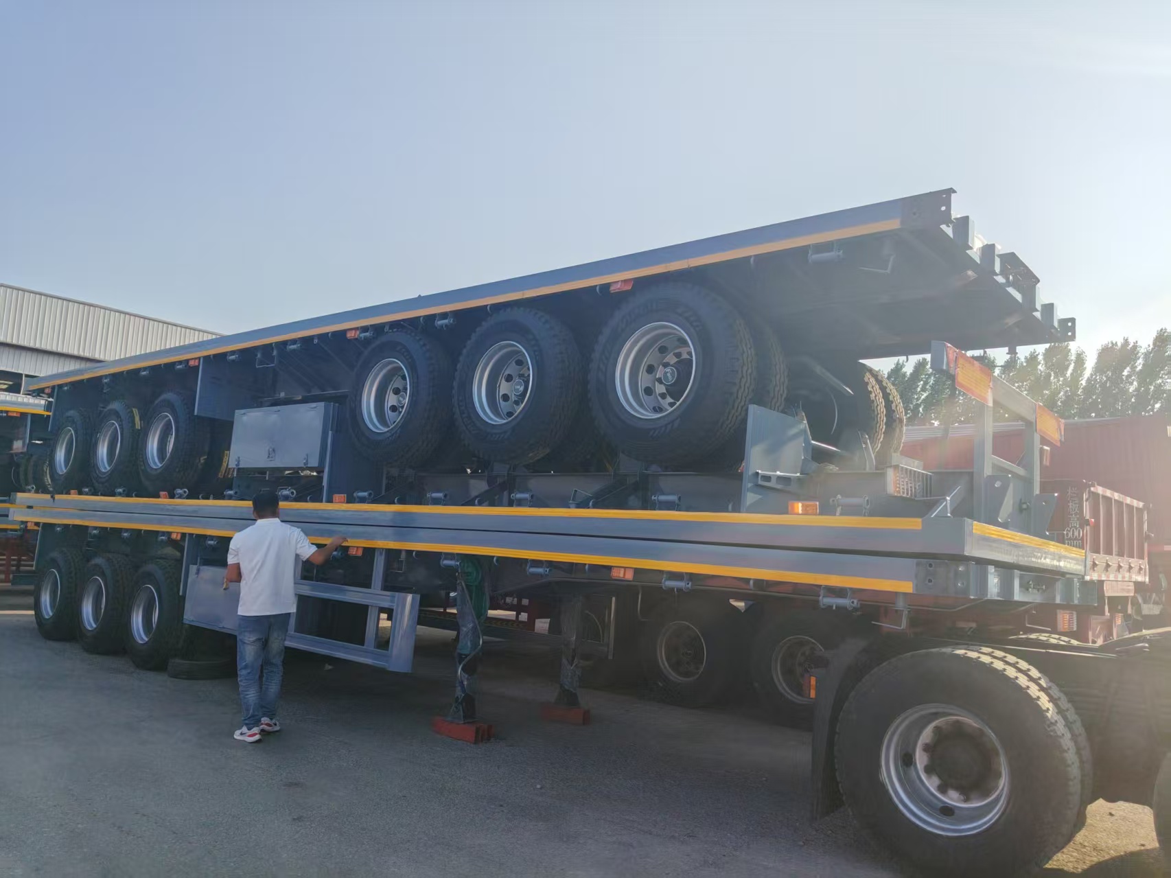 3 Axle Flatbed Semi Trailer For Heavy Cargo Transport