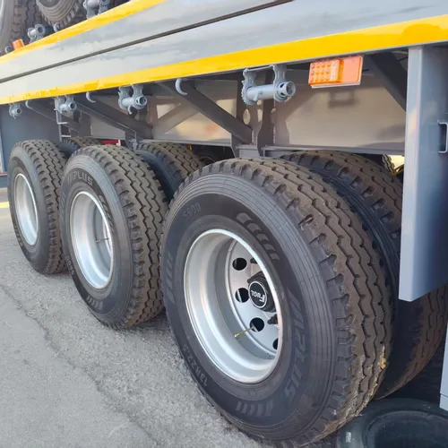 3 Axle Flatbed Semi Trailer For Heavy Cargo Transport