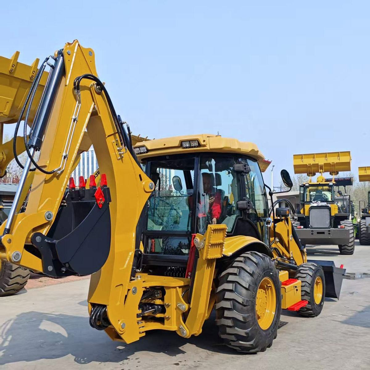 Backhoe and front loader machine for excavation and loading tasks