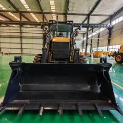 Hydraulic backhoe loader operating on rough terrain with stable performance