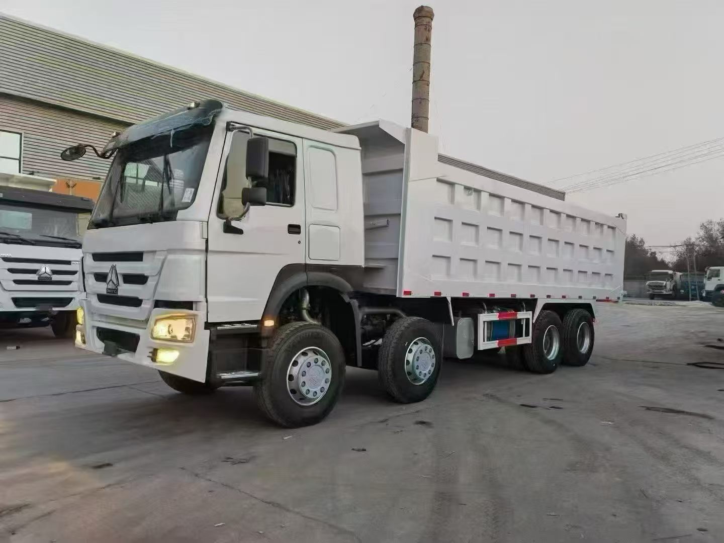 Sinotruk Howo 4-Axle 8*4 Heavy-Duty Dumper For Sand Coal Infrastructure Second-Hand Tipper Lorry