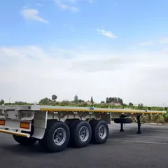New White Tri-Axle Flatbed Container Semi Trailer Lightweight 40ft Q345 Steel 13Ton FUWA Axle