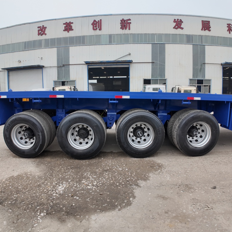 New Tri-Axle Flatbed Container Semi Trailer 20/40/45ft Q345 High Strength Steel Load 40-80 Ton