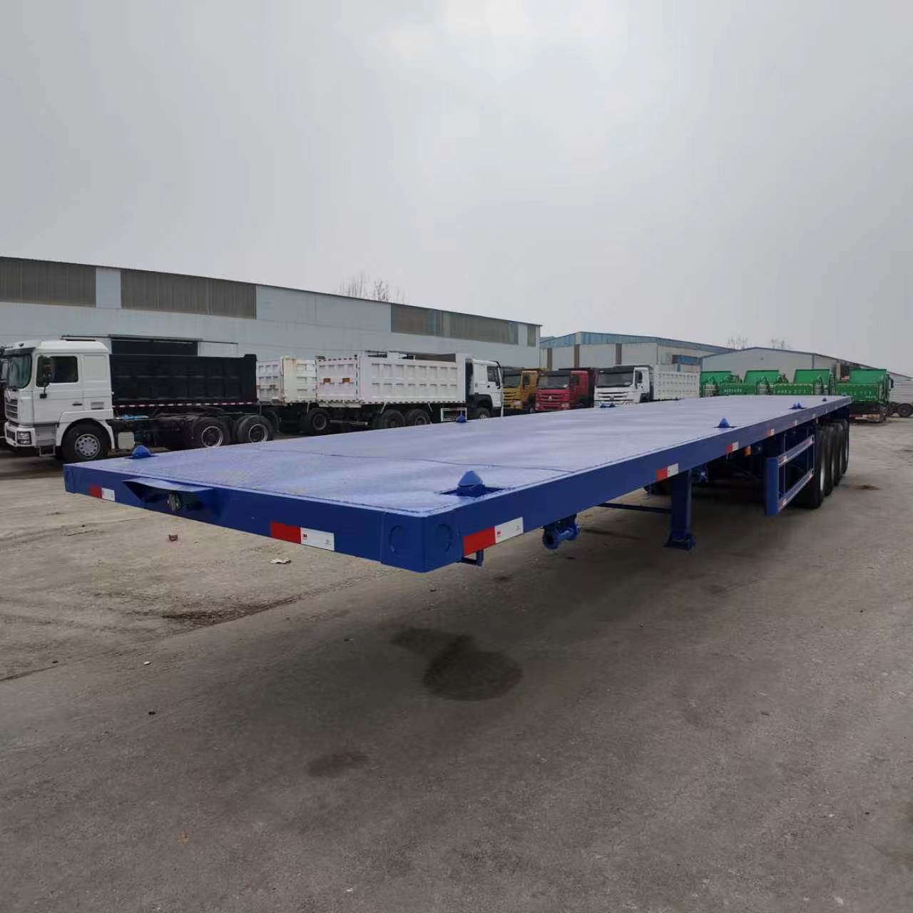 New Tri-Axle Flatbed Container Semi Trailer 20/40/45ft Q345 High Strength Steel Load 40-80 Ton
