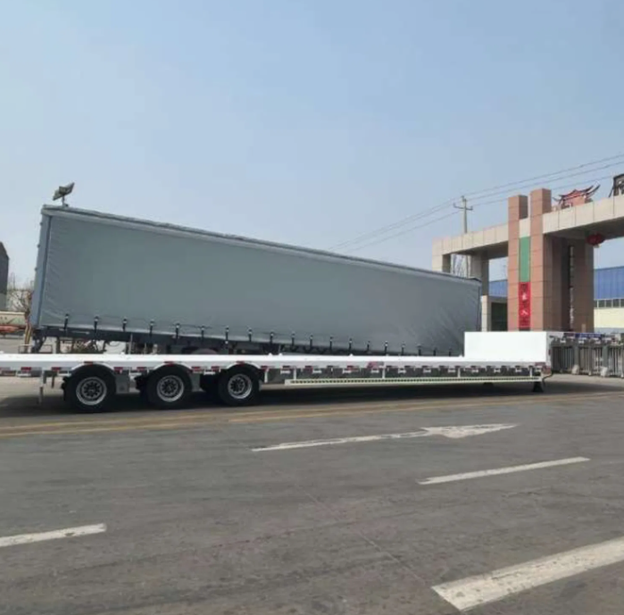 Heavy Duty Flatbed Semi Trailer High Load Capacity for Construction Material Transportation