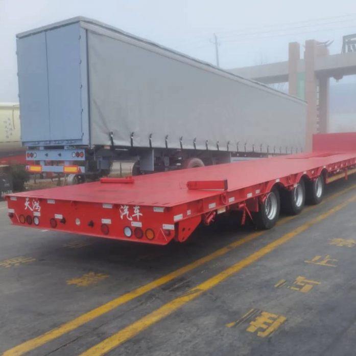 Heavy Duty Flatbed Semi Trailer High Load Capacity for Construction Material Transportation