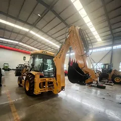 Mini tractor backhoe loader working on construction site