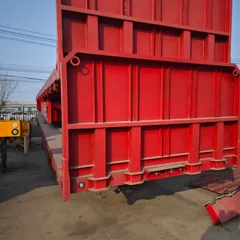 Heavy-Duty 40ft Tri-Axle Steel Flatbed Semi-Trailer with 80T Capacity for Multi-Purpose Cargo and Container Transport