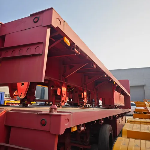 Heavy-Duty 40ft Tri-Axle Steel Flatbed Semi-Trailer with 80T Capacity for Multi-Purpose Cargo and Container Transport