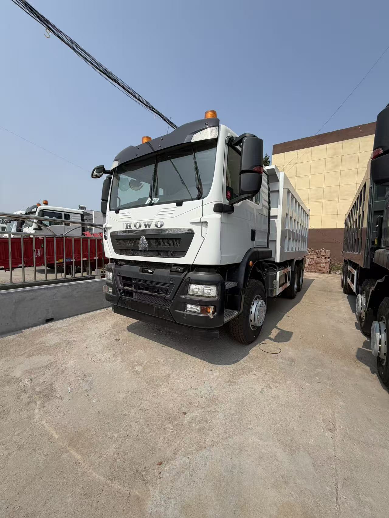 Used SINOTRUK HOWO TX 6×4 Dump Truck 10-wheel Heavy Chassis Diesel & CNG Engine Fast Gearbox Mining Tipper For Africa Middle East