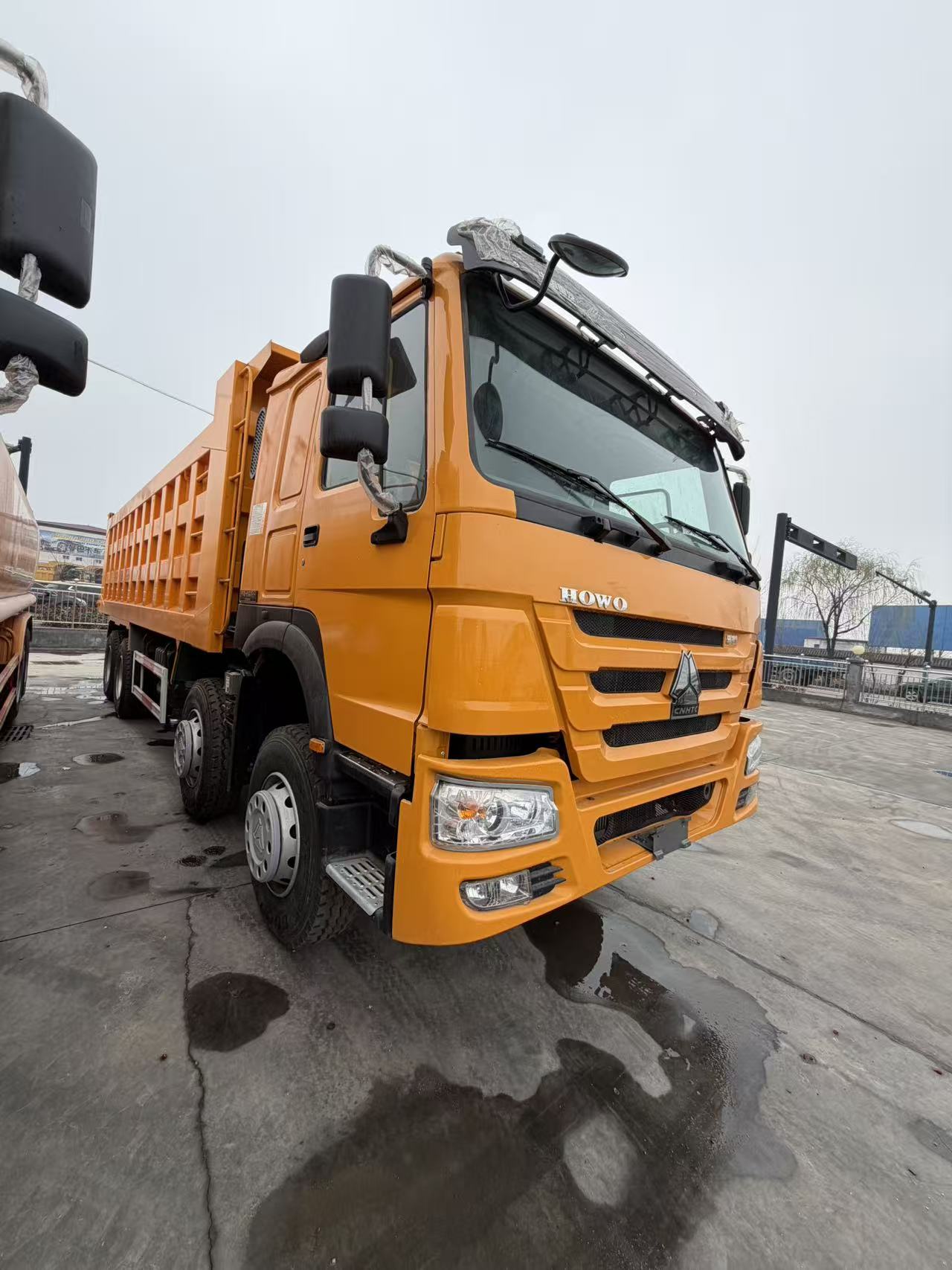 Used SINOTRUK HOWO 8X4 Dump Truck 371HP Big Pump Engine Euro II Standard Reinforced Chassis & Box For Mine Waste Transport Africa Middle East