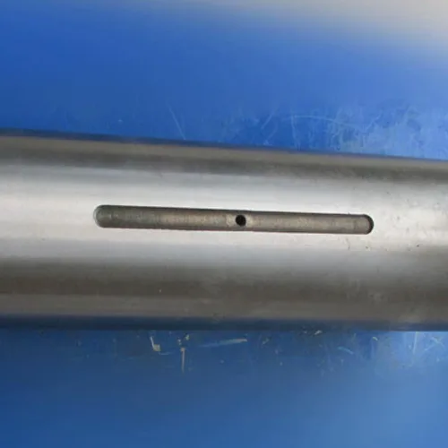 Genuine XCMG LW900K loader spare part 253100715 (Drawing No. 800KII.8.7) is a high-strength OEM articulation pin engineered specifically for the Z-bar linkage system of the 9-ton LW900K