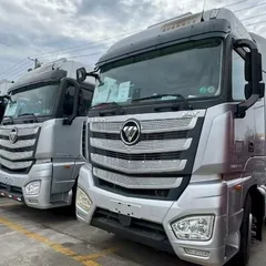 Factory Direct Used AUMAN EST Flat Floor Truck Tractor 580HP Double Layer Chassis Leaf Spring Suspension For Central Asia Southeast Asia Freight Bulk Shipment