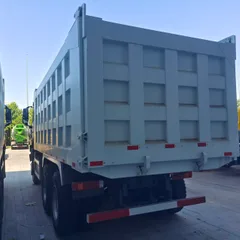 New Heavy Duty HOWO NX Rear 8 Wheel Mining Tipper Truck Complete Original Engine Chassis Hydraulic System For Overseas Infrastructure Mining Project Transport