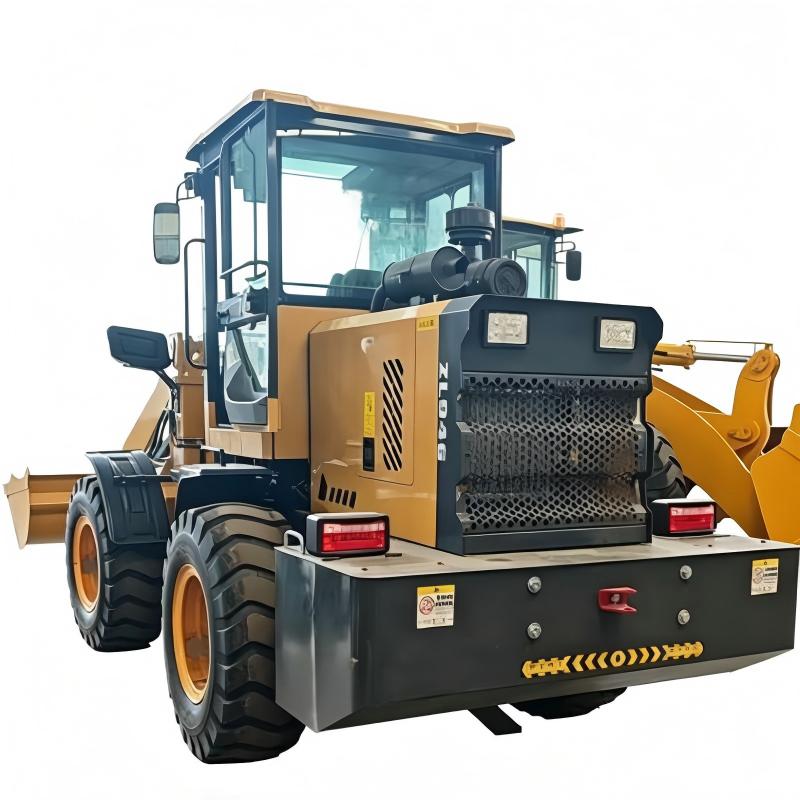 SHENTUI 946 compact wheel loader working in a narrow material yard