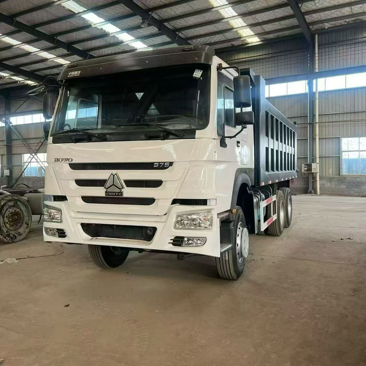 Used HOWO 375HP 6×4 Rear Tipper Dump Truck Custom White Cab Black Cargo Box For Mine Sand Stone Construction Transport Whole Vehicle Export FOB USD Price Available