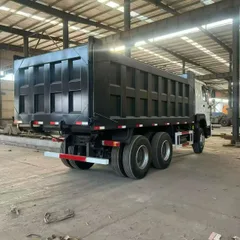 Used HOWO 375HP 6×4 Rear Tipper Dump Truck Custom White Cab Black Cargo Box For Mine Sand Stone Construction Transport Whole Vehicle Export FOB USD Price Available