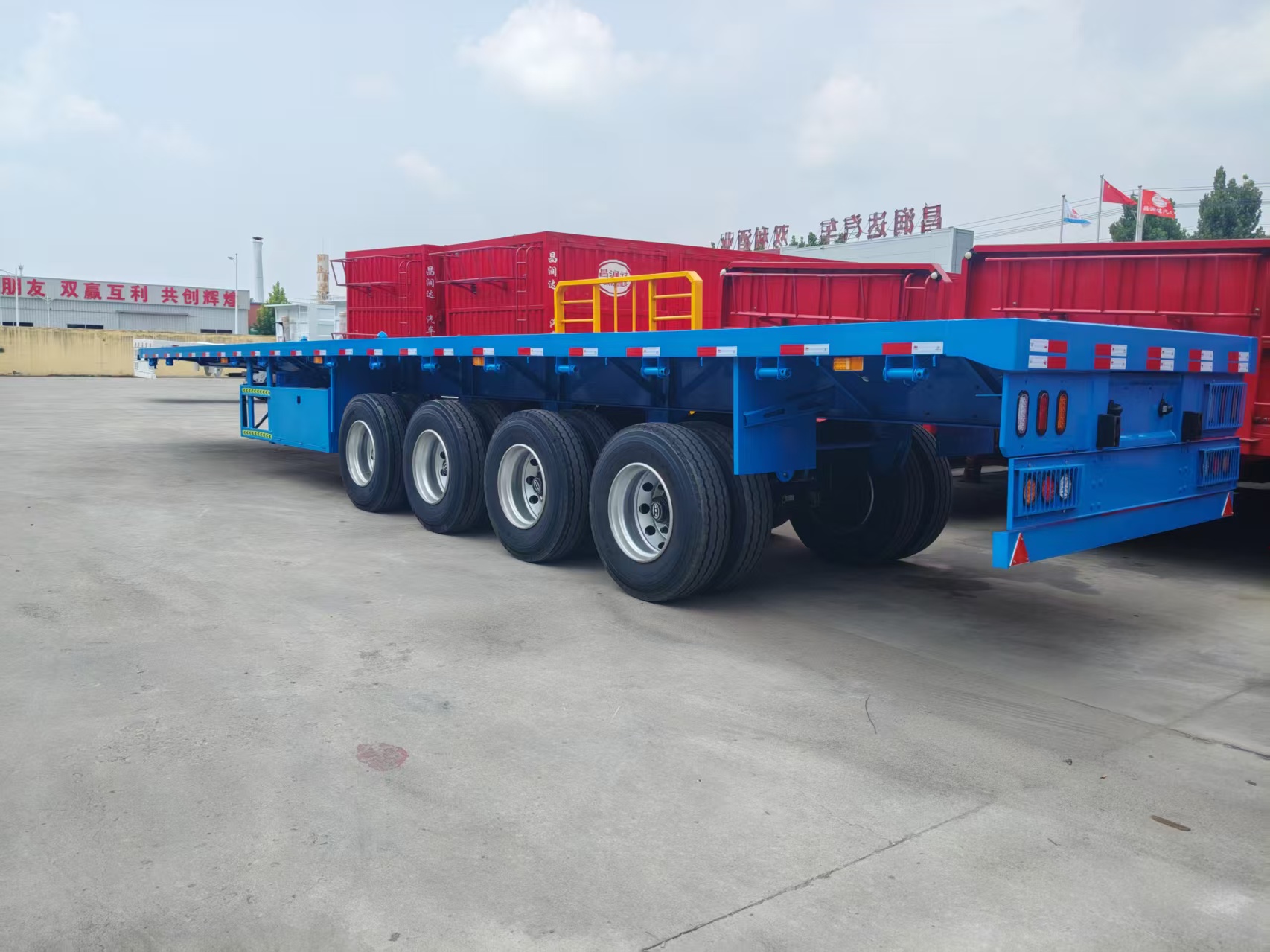 Heavy‑duty 4‑axle flatbed semi‑trailer for container & cargo transport FOB Tianjin Port